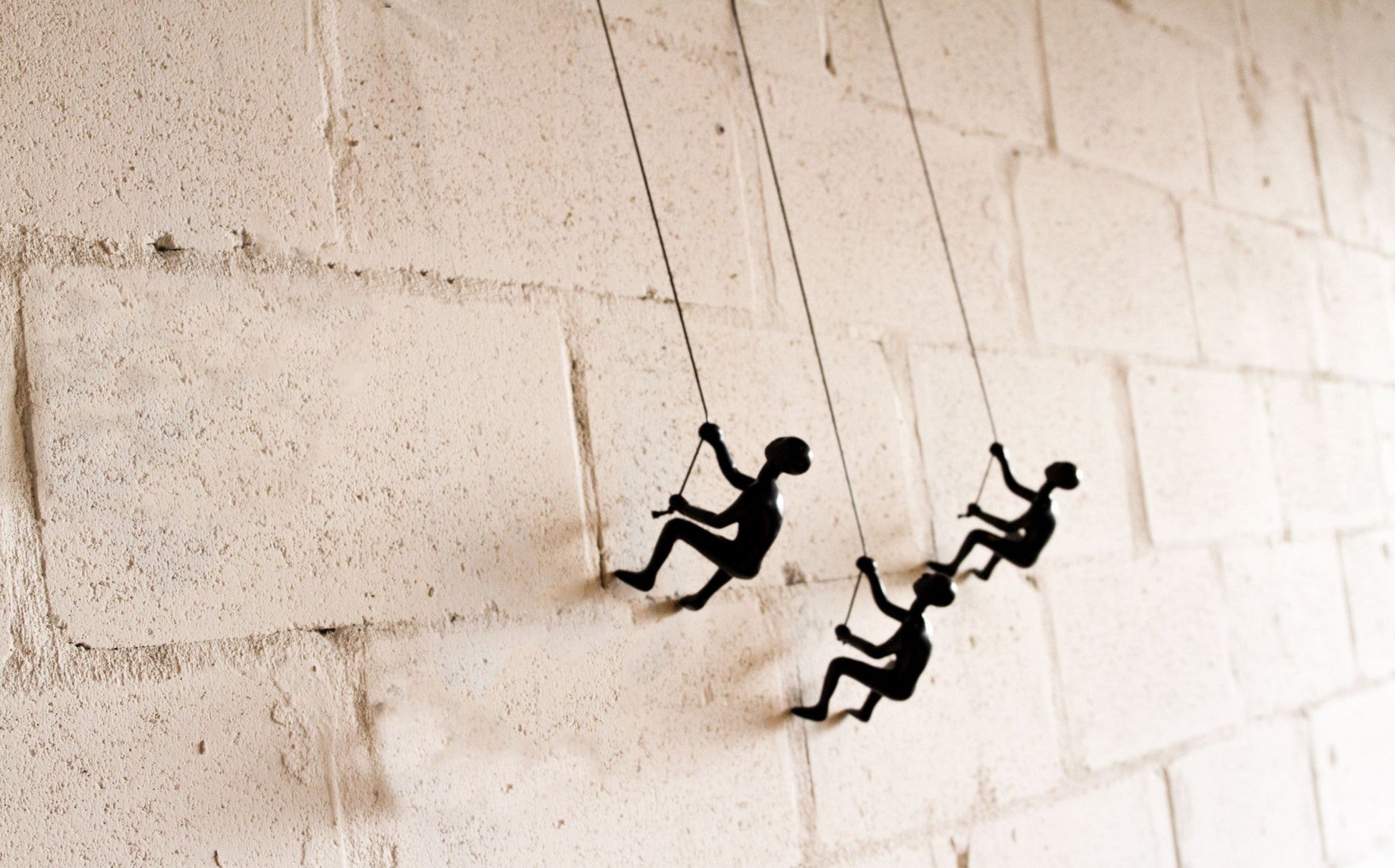 Set of Three Black Resin Climbing Man Hanging Dimensional Sculpture