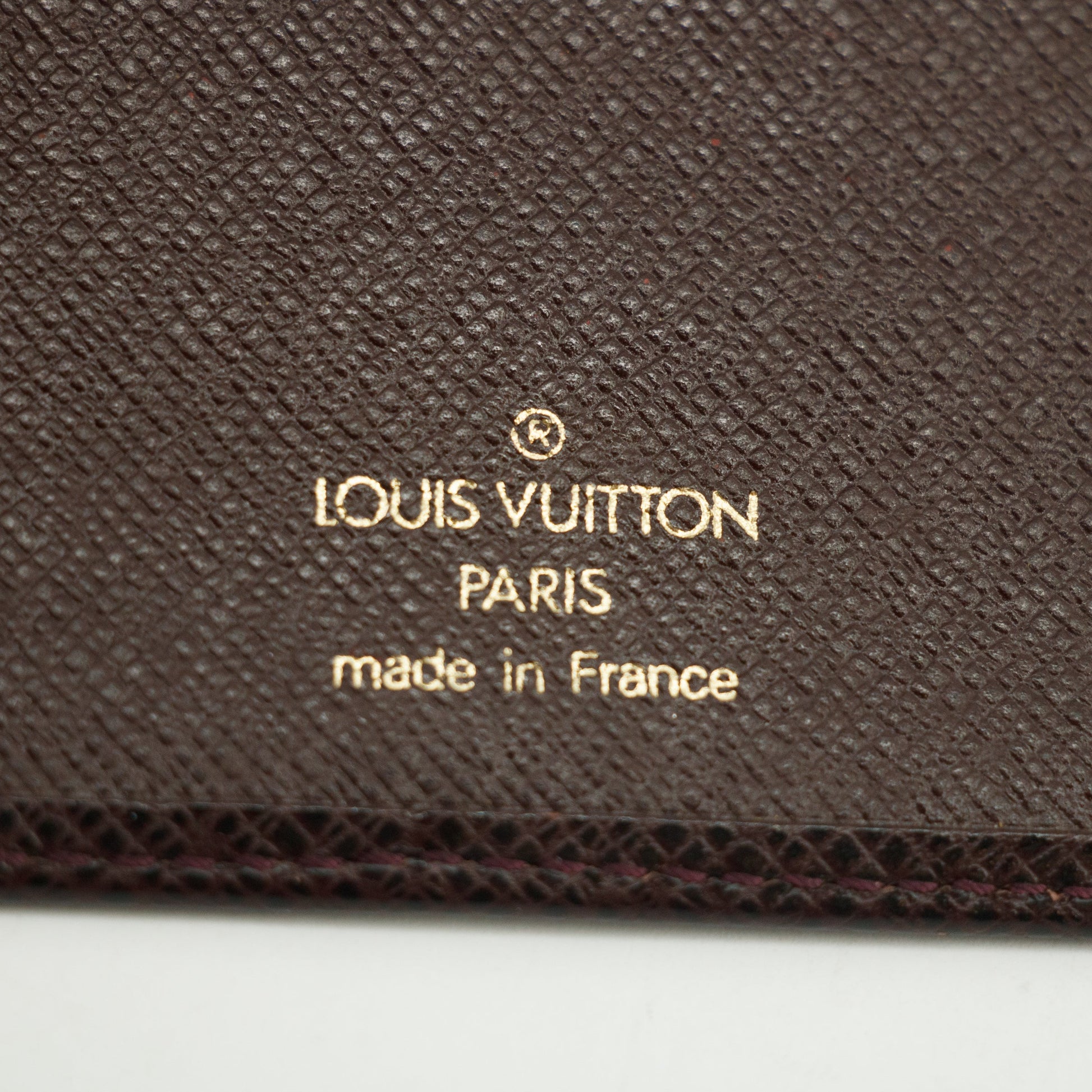 Louis Vuitton Taiga Raisin Bifold Wallet  #3017