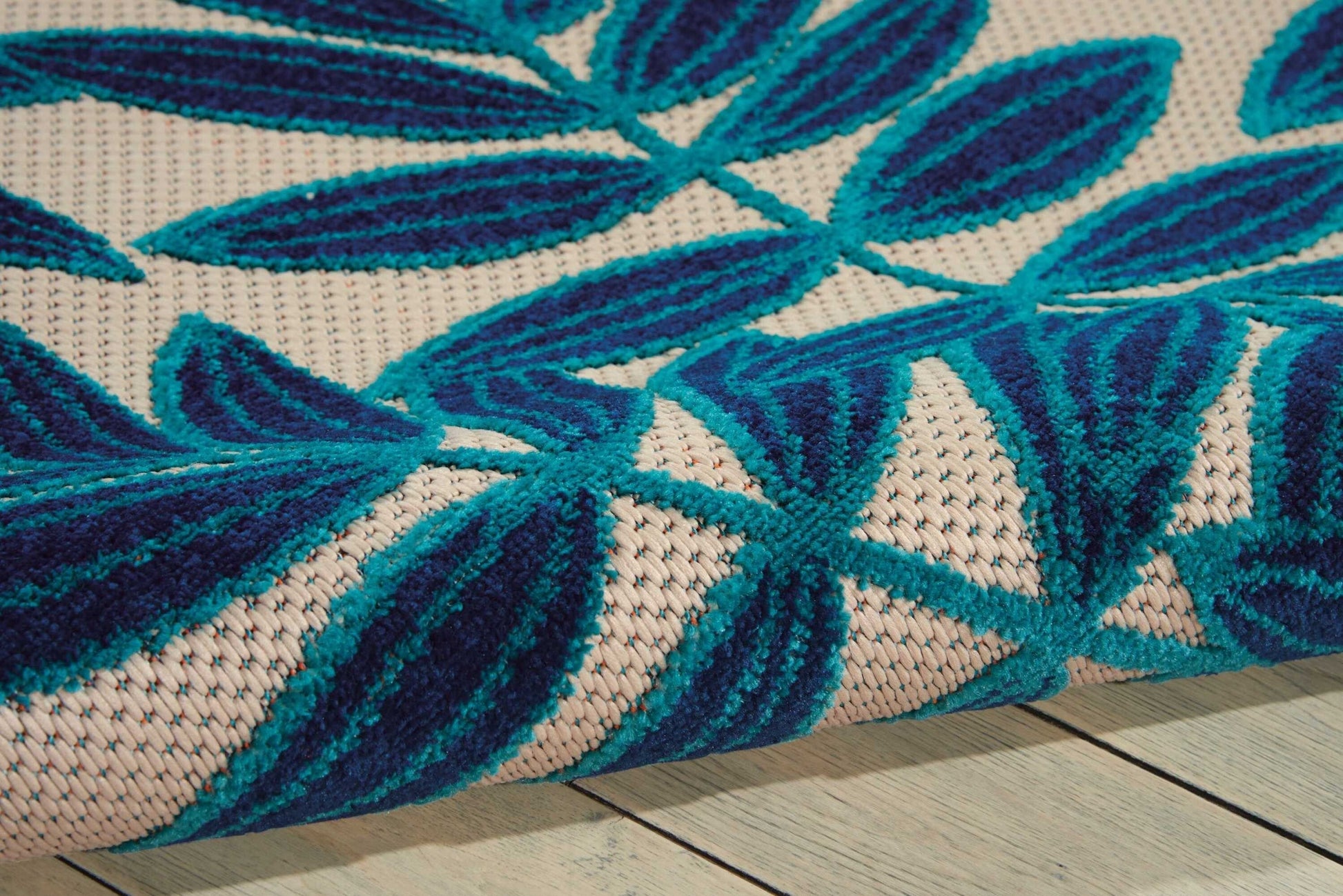 8' x 11' Navy and Beige Leaves Indoor Outdoor Area Rug