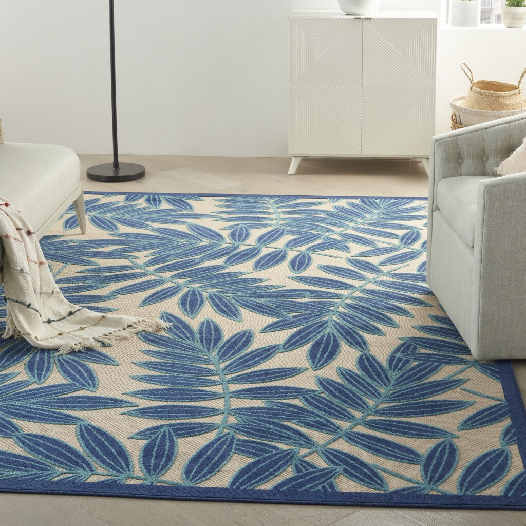 7' x 10' Navy and Beige Leaves Indoor Outdoor Area Rug