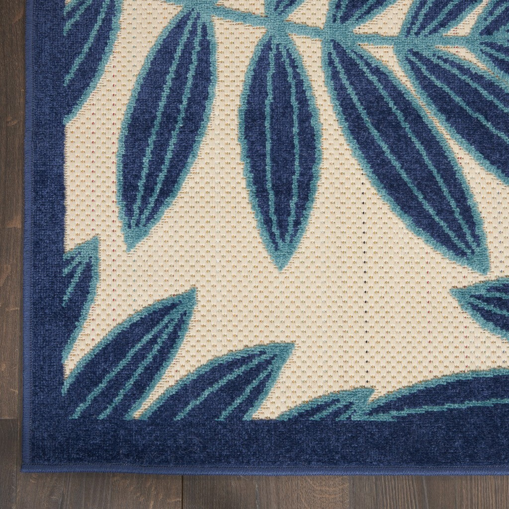 7' x 10' Navy and Beige Leaves Indoor Outdoor Area Rug