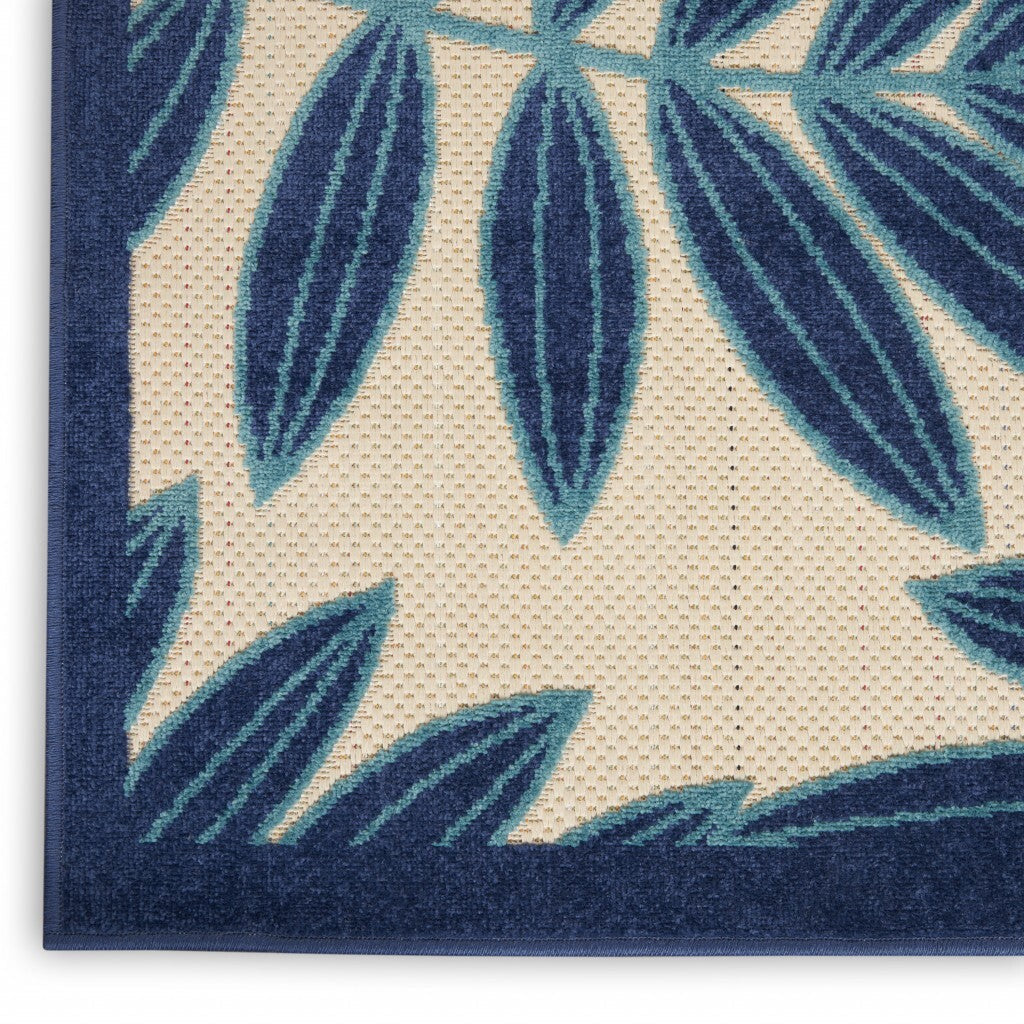 7' x 10' Navy and Beige Leaves Indoor Outdoor Area Rug