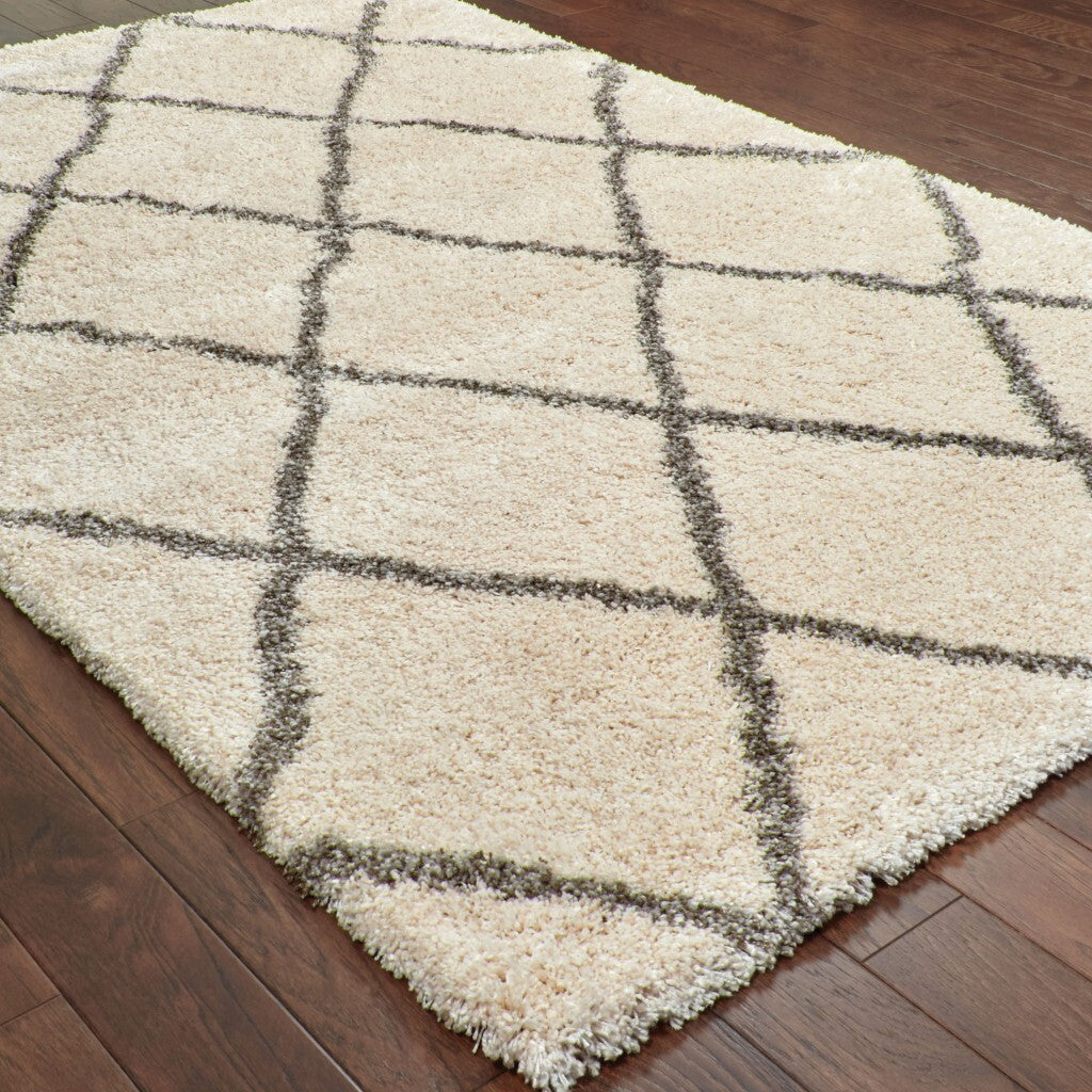5' X 8' Ivory And Gray Geometric Lattice Area Rug