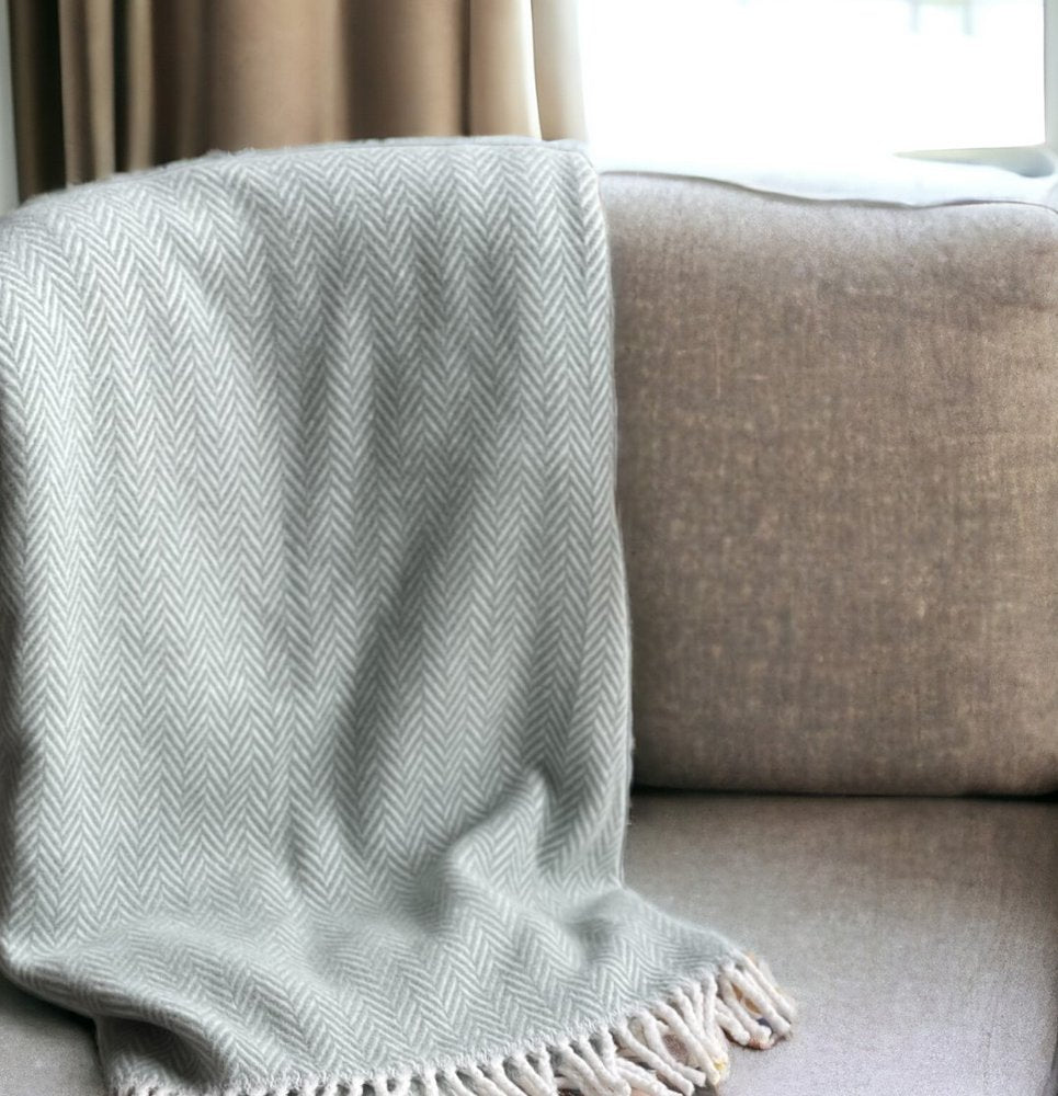 70" X 55" Copper And White Cotton Blend Woven Herringbone Plush Throw Blanket with Tassels