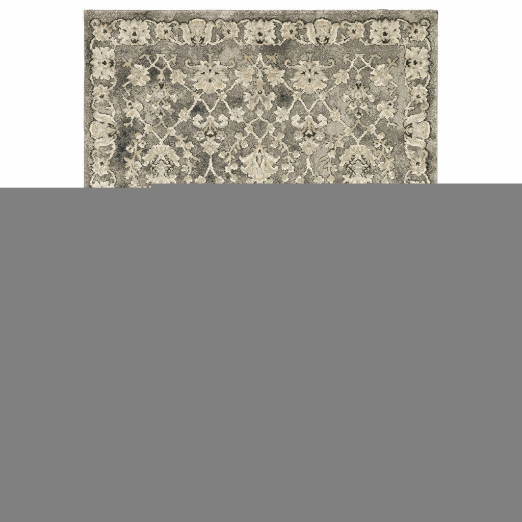 5' X 8' Grey Beige Tan And Brown Oriental Power Loom Stain Resistant Area Rug