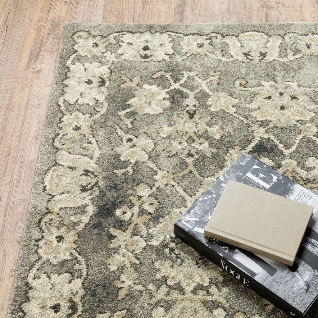 5' X 8' Grey Beige Tan And Brown Oriental Power Loom Stain Resistant Area Rug