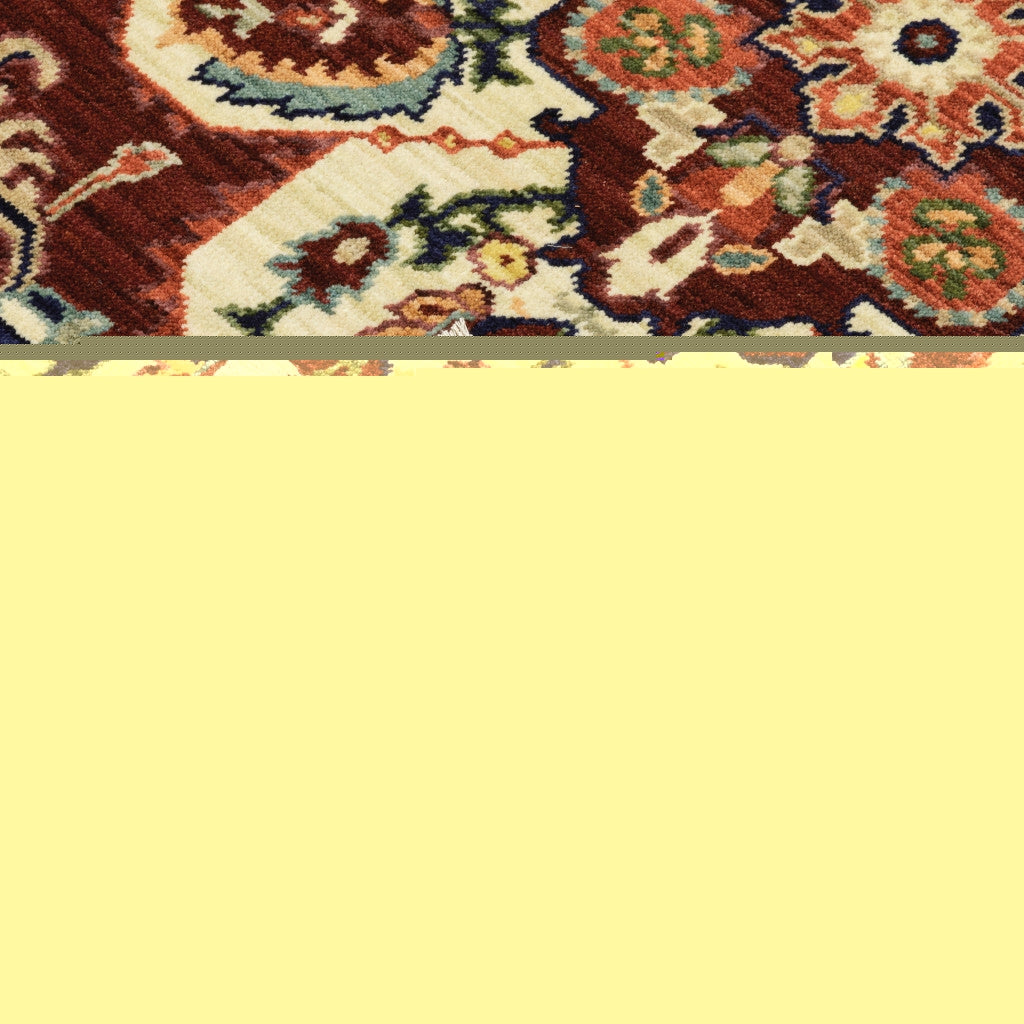 3' X 5' Red Ivory Orange And Blue Oriental Power Loom Stain Resistant Area Rug With Fringe