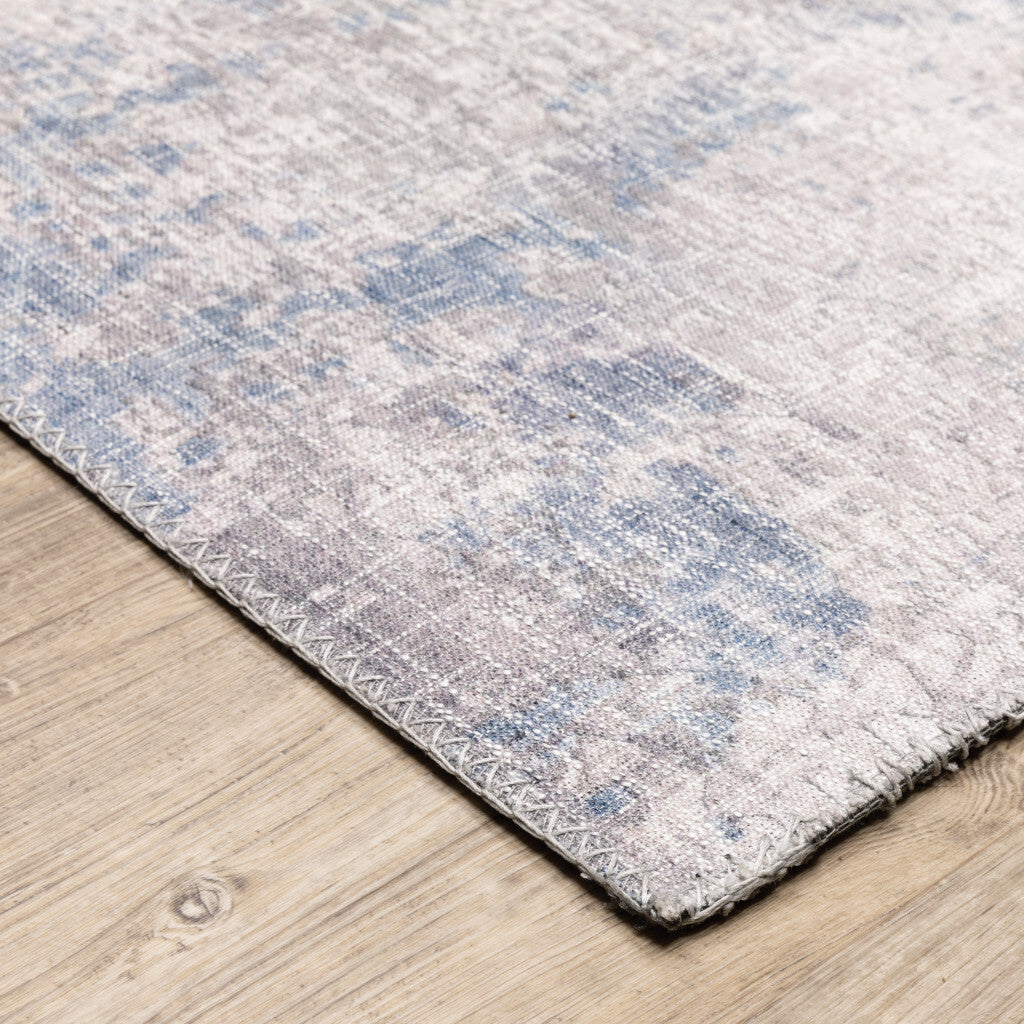 5' X 7' Grey And Blue Abstract Power Loom Stain Resistant Area Rug