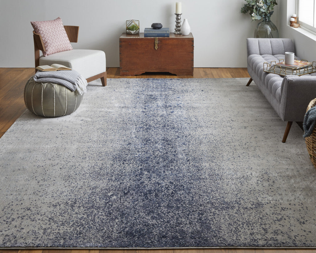 5' X 8' Ivory and Blue Abstract Power Loom Non Skid Area Rug