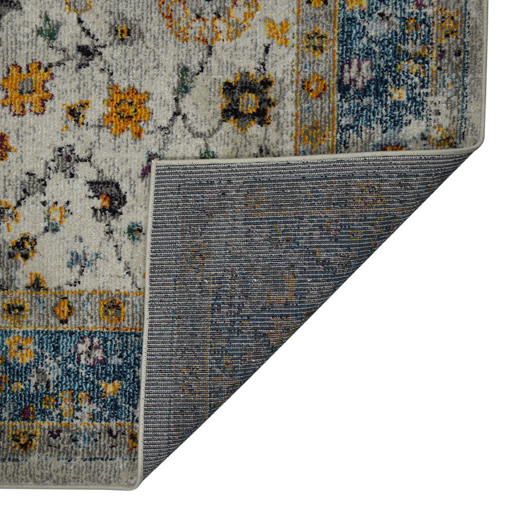 5' x 7' Blue and Orange Floral Power Loom Area Rug