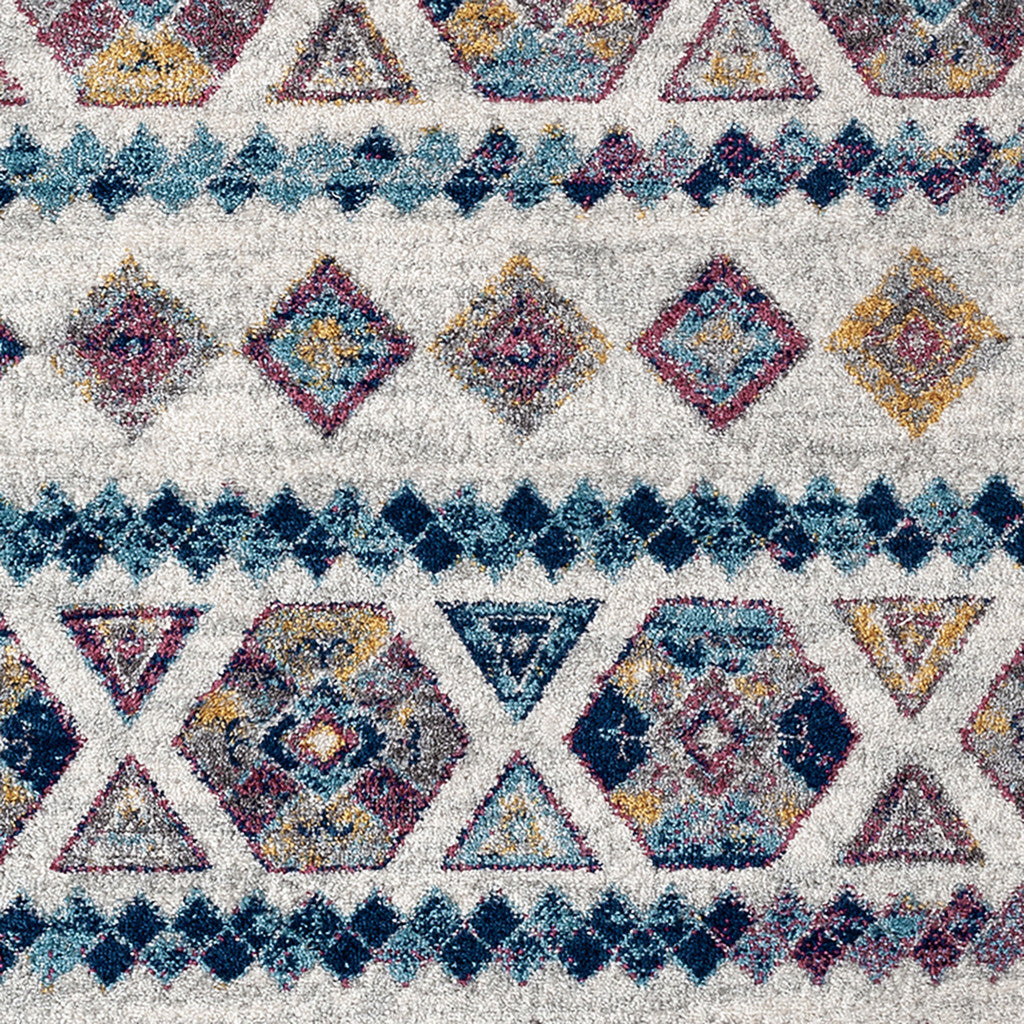 5' X 8' Ivory Blue and Orange Geometric Power Loom Area Rug
