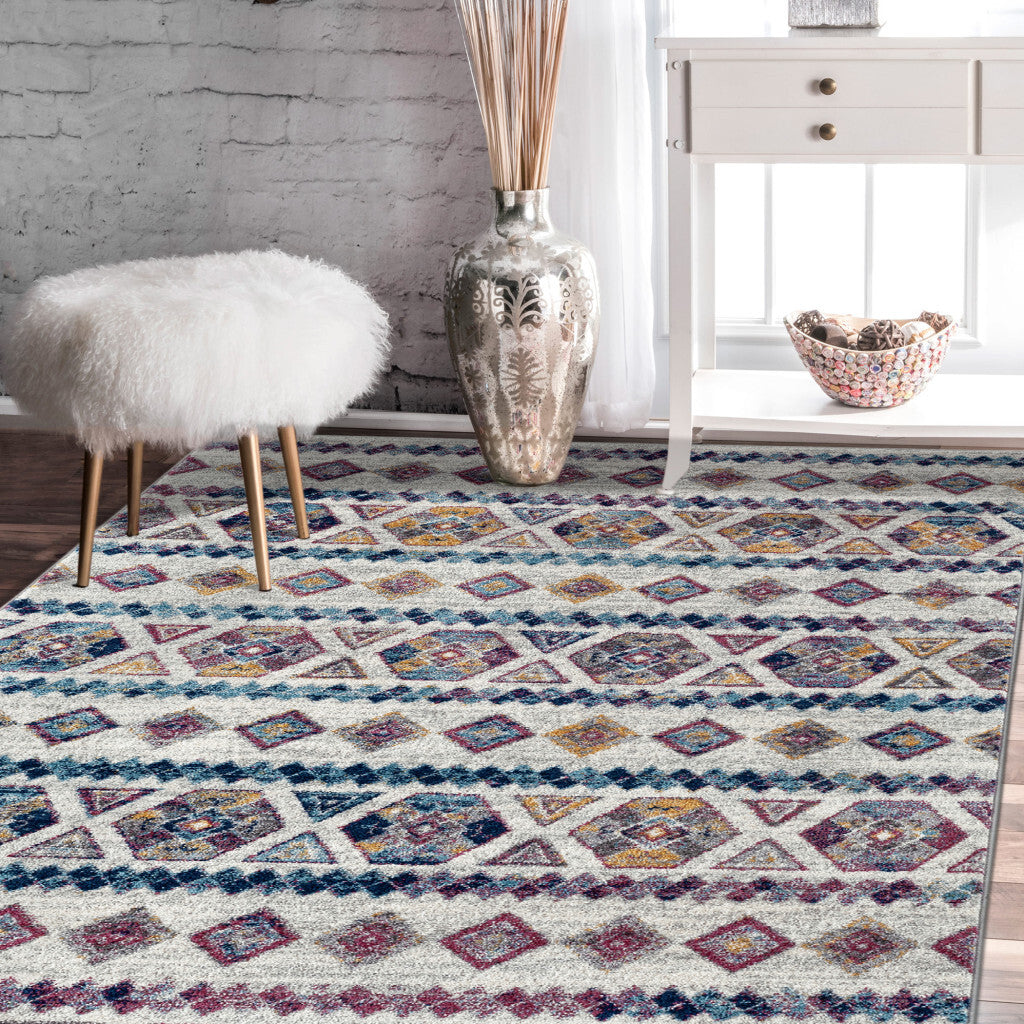 5' X 8' Ivory Blue and Orange Geometric Power Loom Area Rug