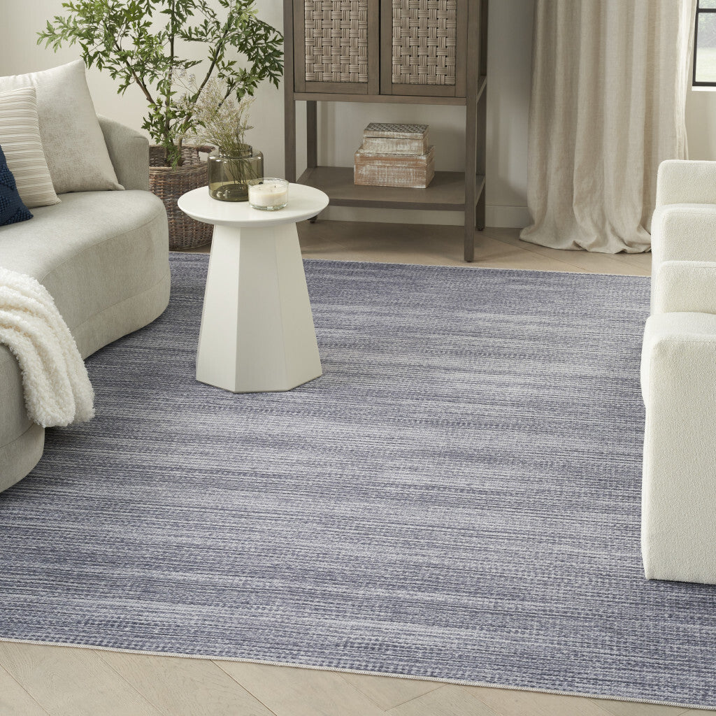 5' x 7' Gray and Ivory Abstract Power Loom Washable Non Skid Area Rug