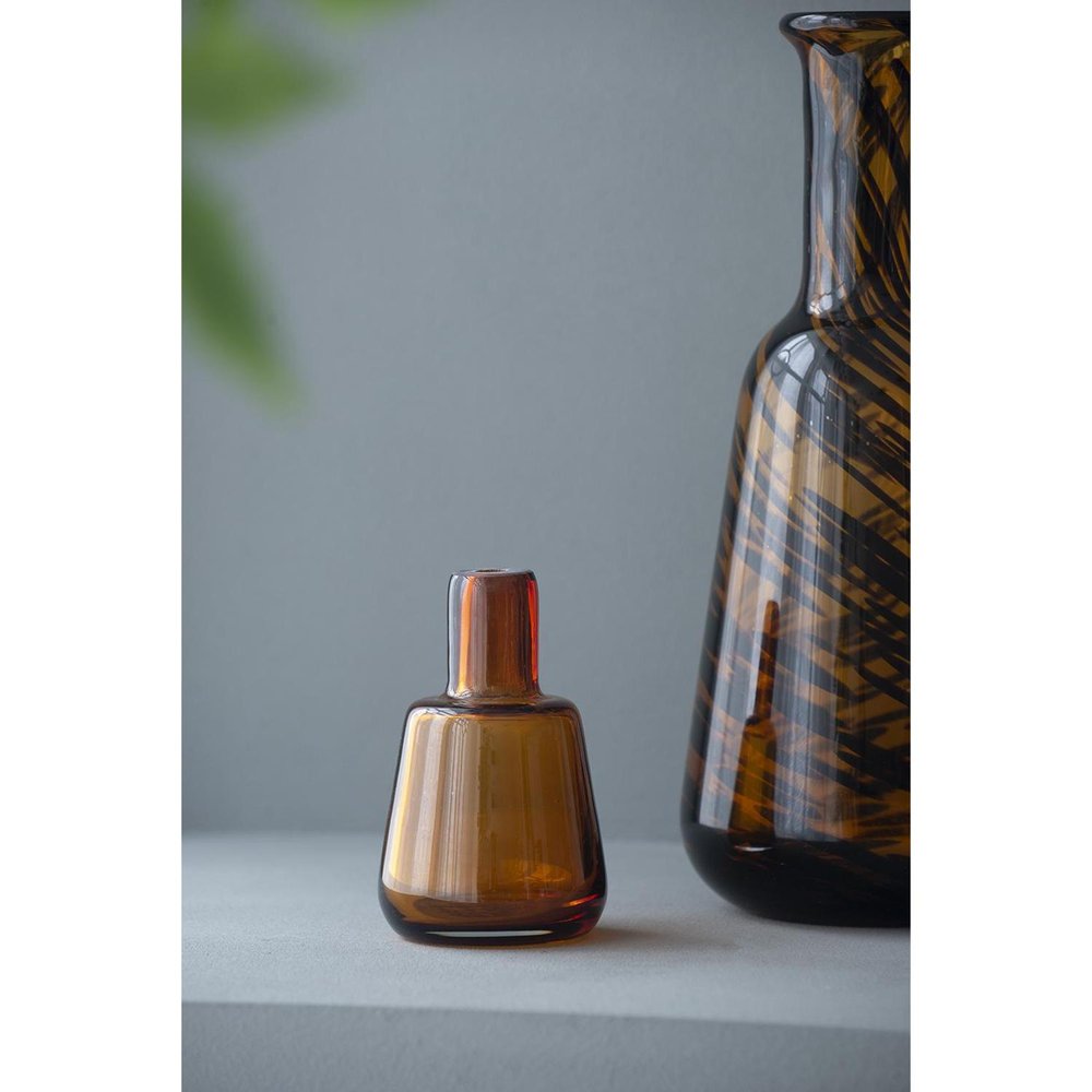 Set of Three Amber Abstract Swirl Glass Decorative Bottles With Stoppers