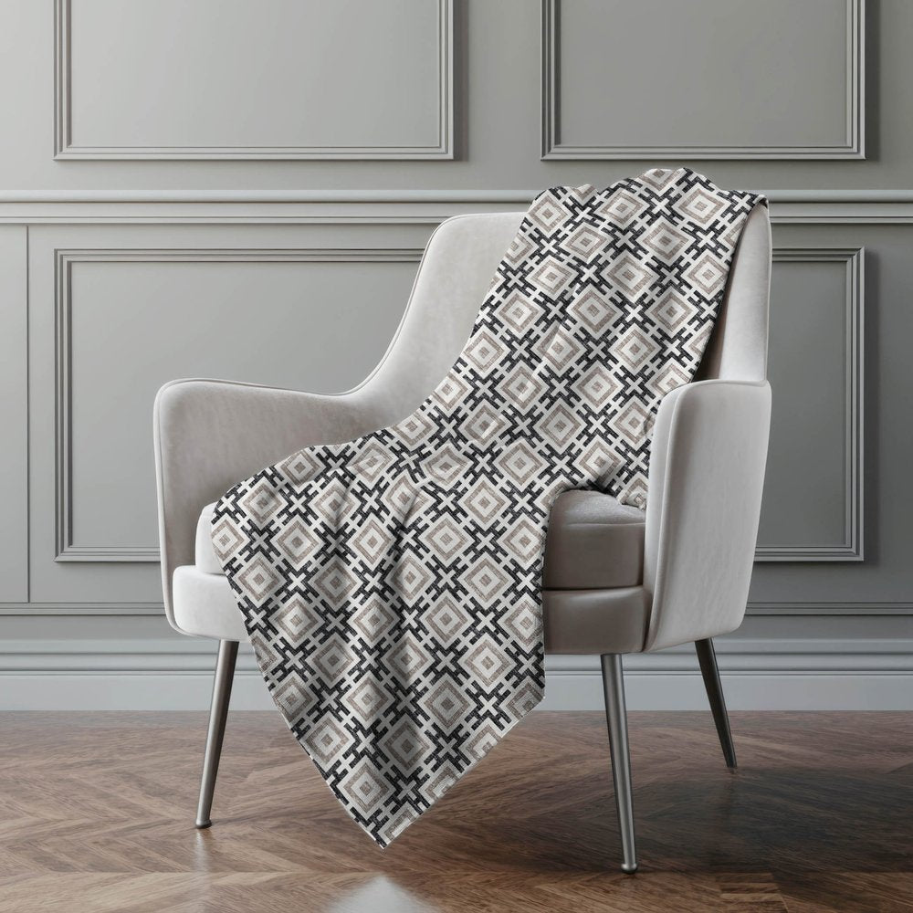 50" X 70" Black And Ivory Geometric Polyester Woven Plush Throw Blanket