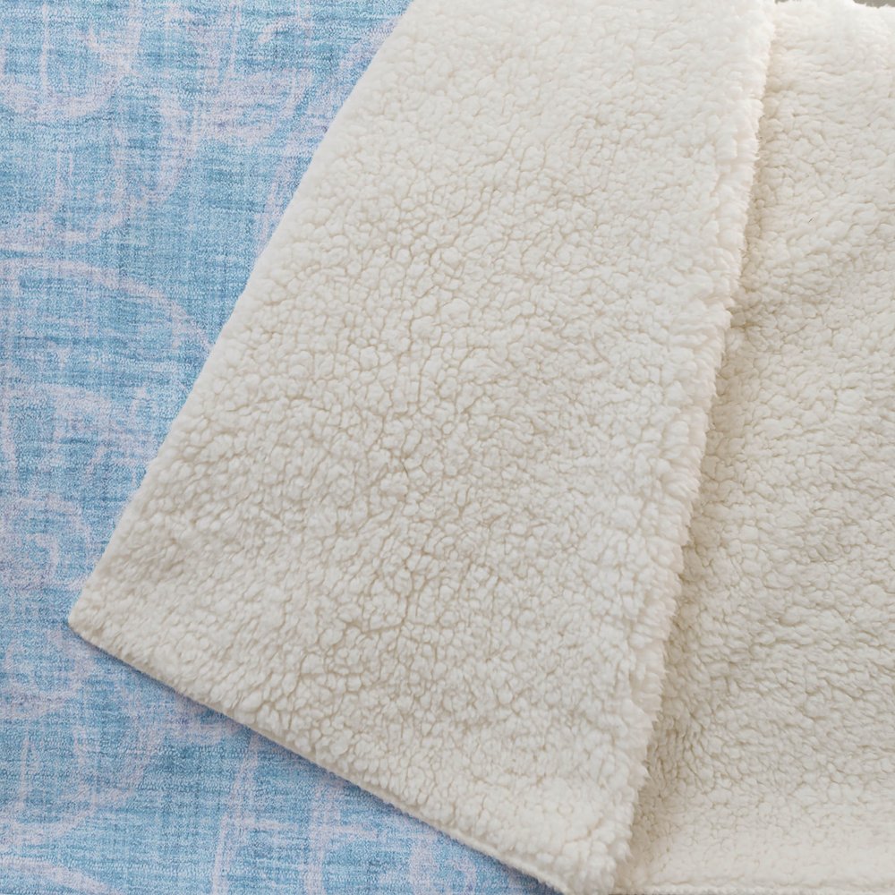 50" X 70" Aqua And Ivory Animal Print Polyester Woven Plush Throw Blanket