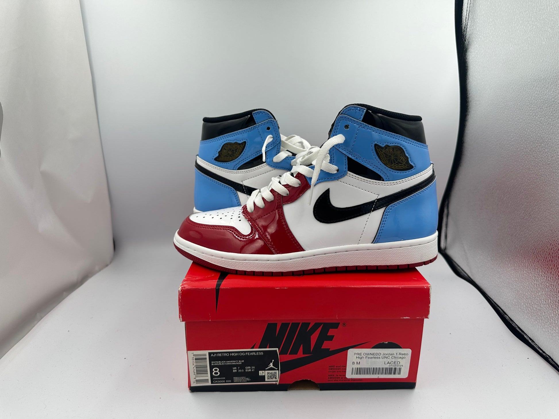 PRE OWNEDD Jordan 1 Retro High Fearless UNC Chicago