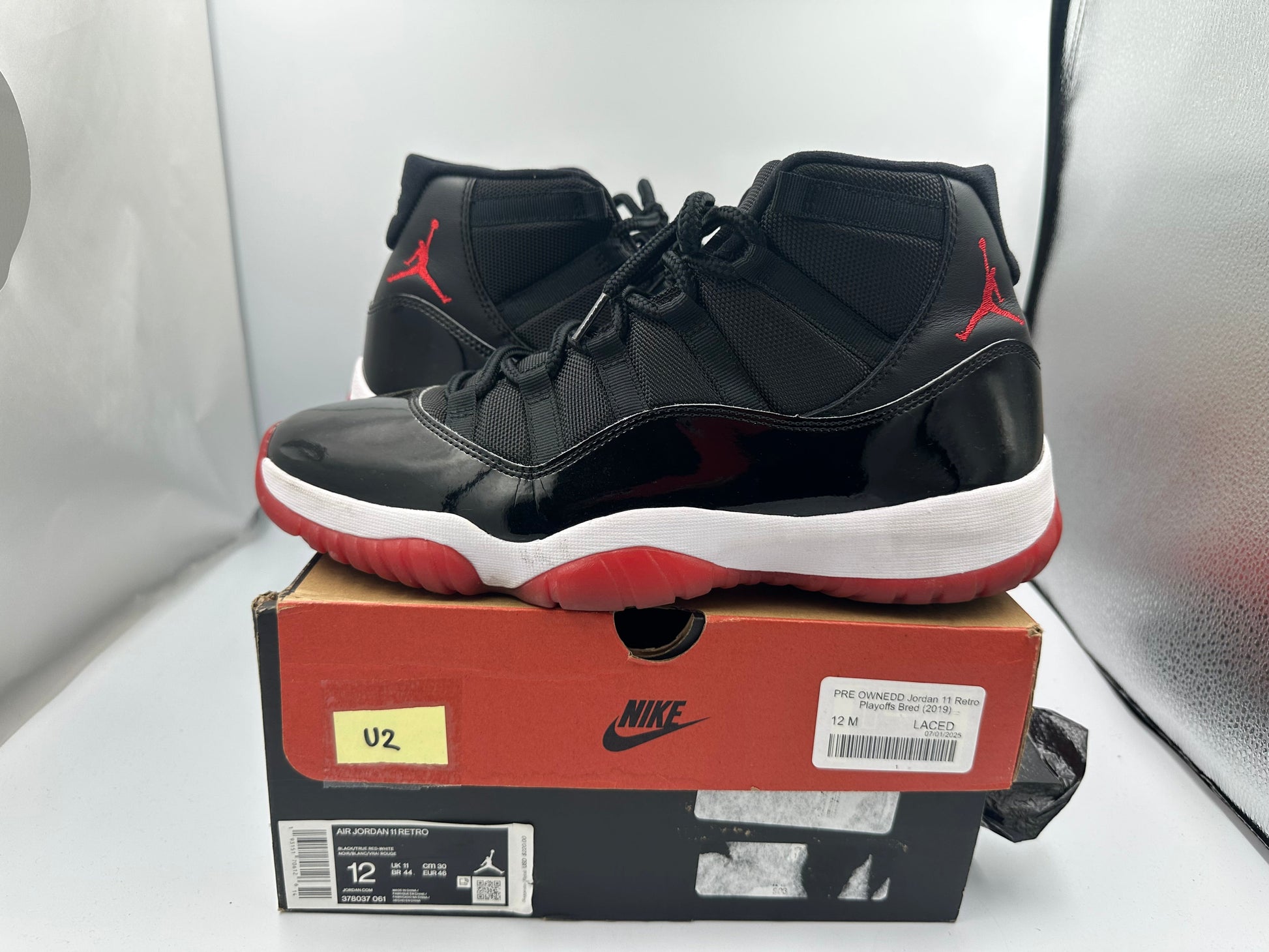 PRE OWNEDD Jordan 11 Retro Playoffs Bred (2019)