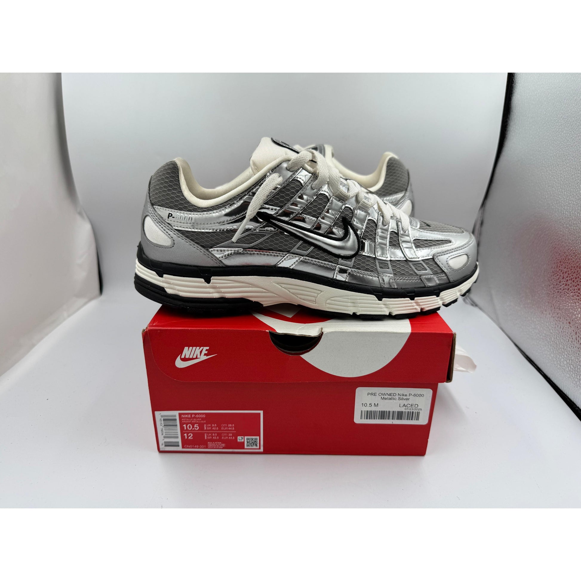 PRE OWNED Nike P-6000 Metallic Silver