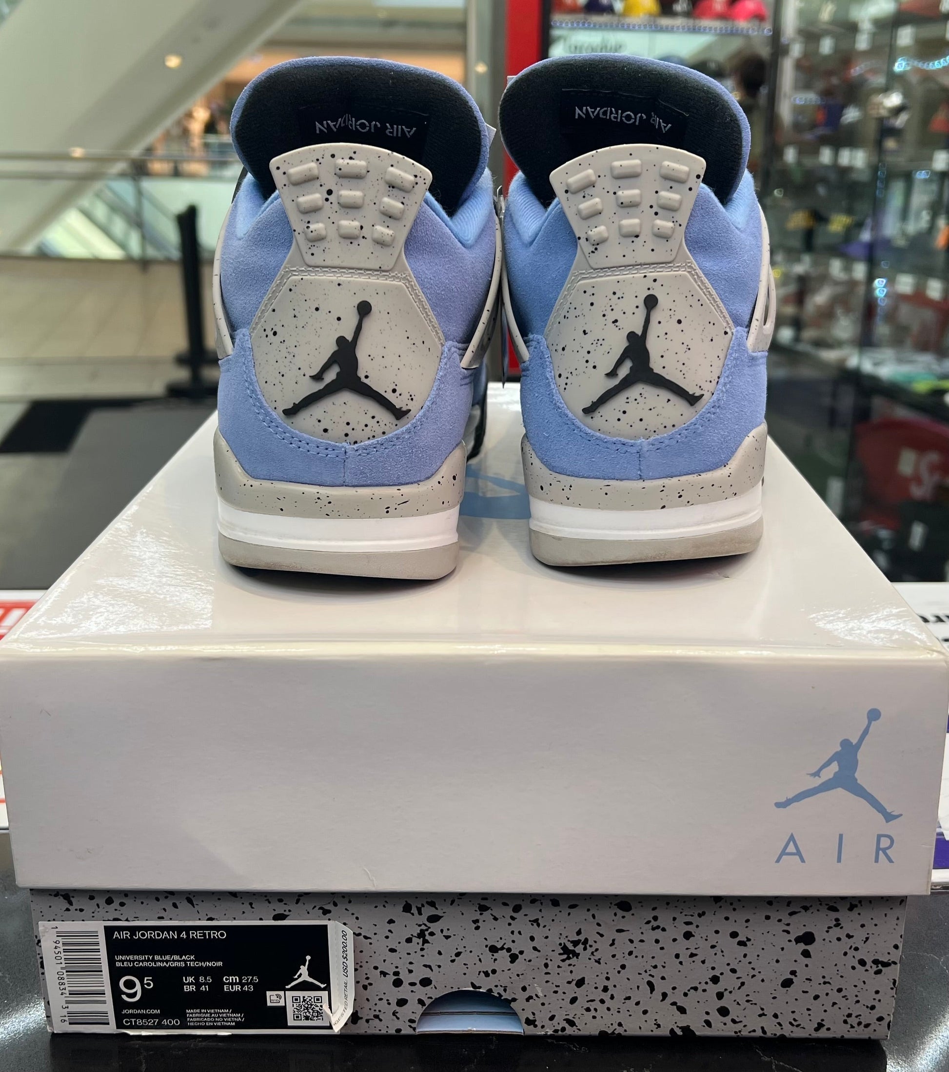 PRE OWNED Jordan 4 Retro University Blue