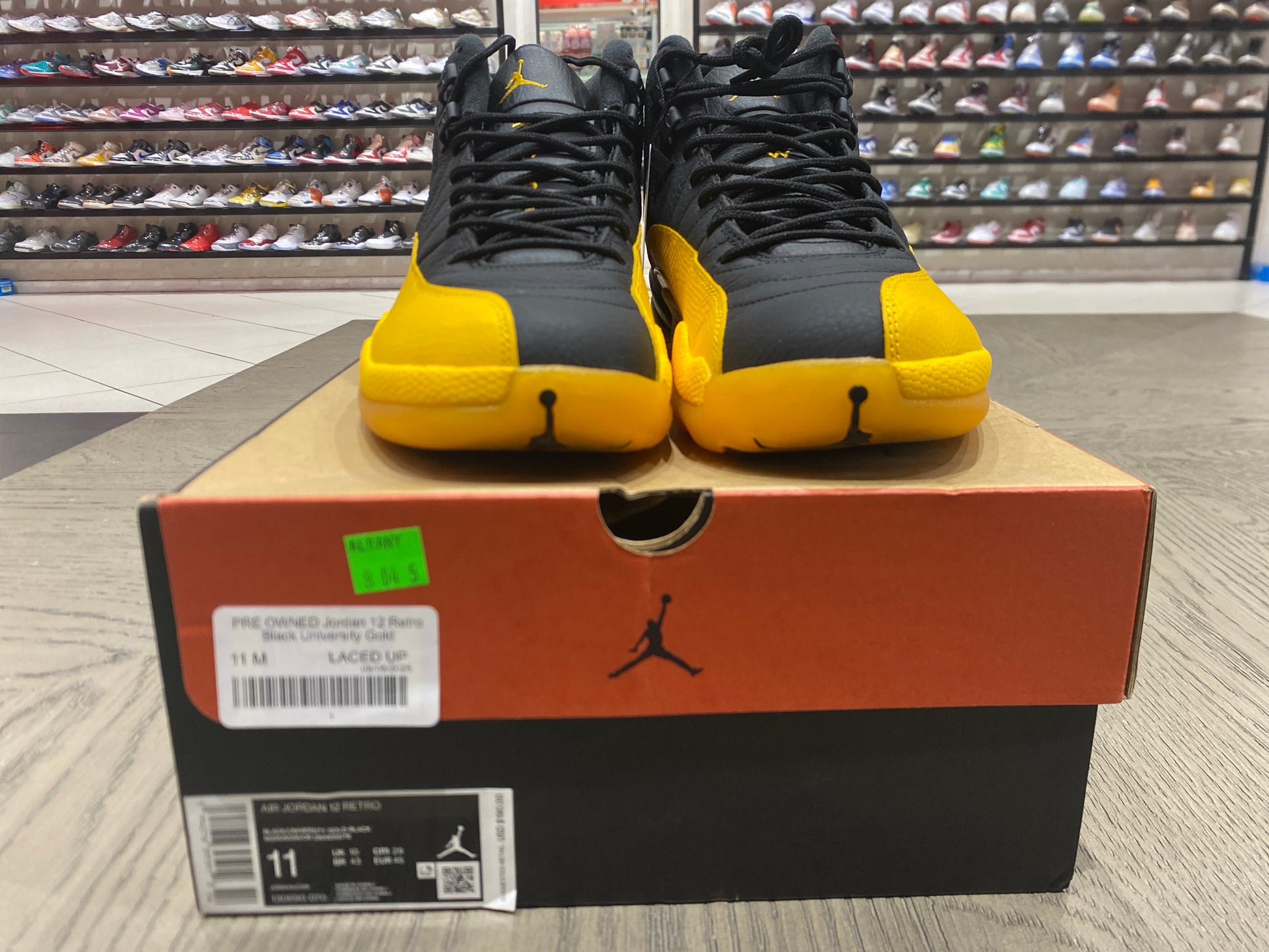 PRE OWNED Jordan 12 Retro Black University Gold