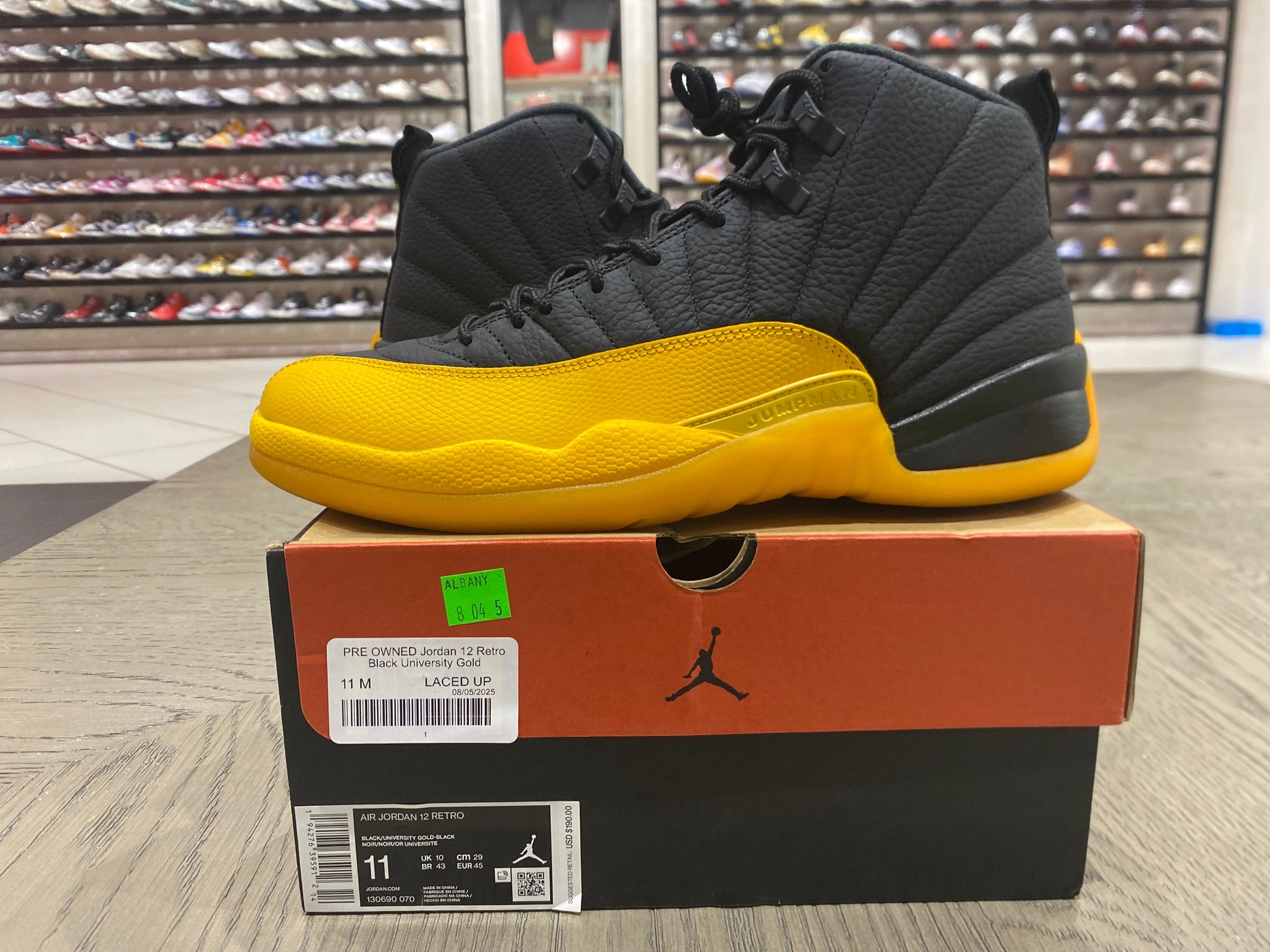 PRE OWNED Jordan 12 Retro Black University Gold