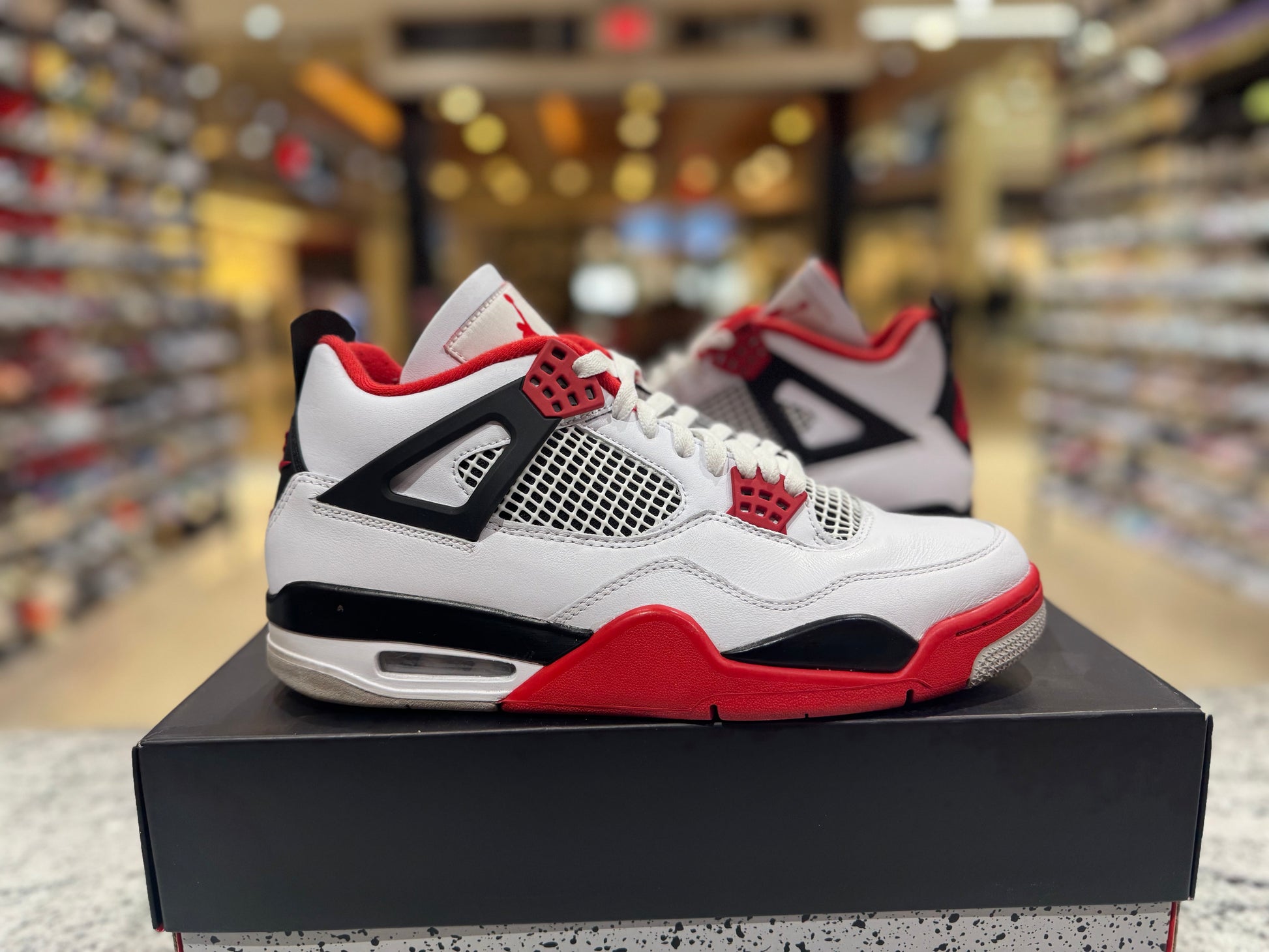 PRE OWNED Air Jordan Retro 4 “Fire Red”