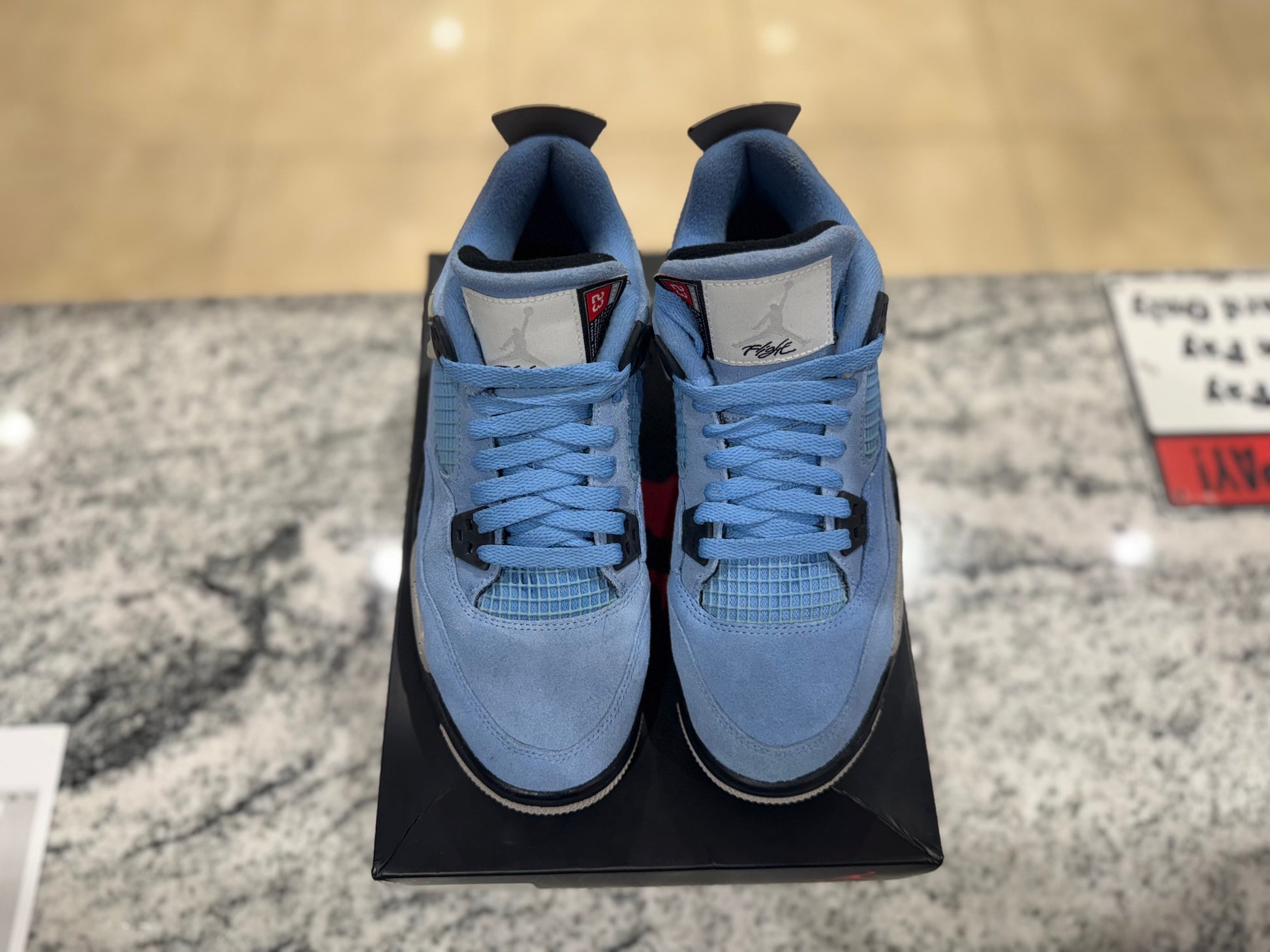 PRE OWNED Jordan 4 Retro University Blue (GS)