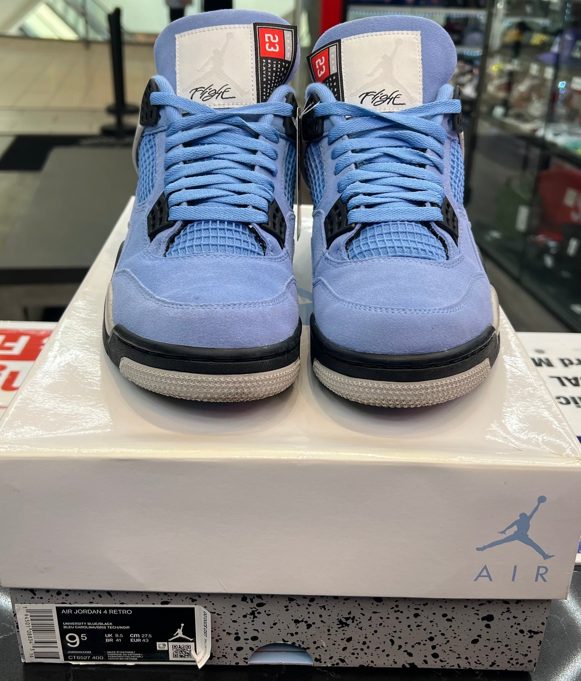 PRE OWNED Jordan 4 Retro University Blue