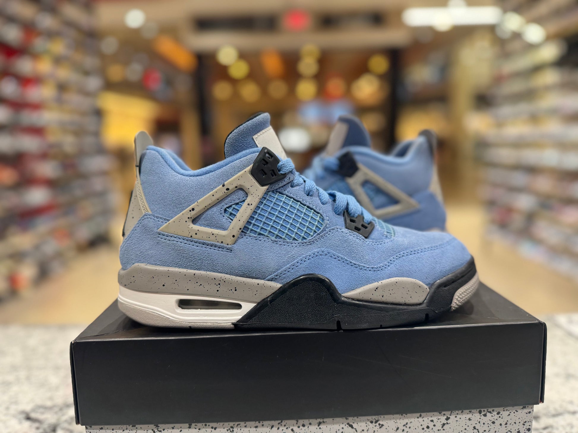 PRE OWNED Jordan 4 Retro University Blue (GS)