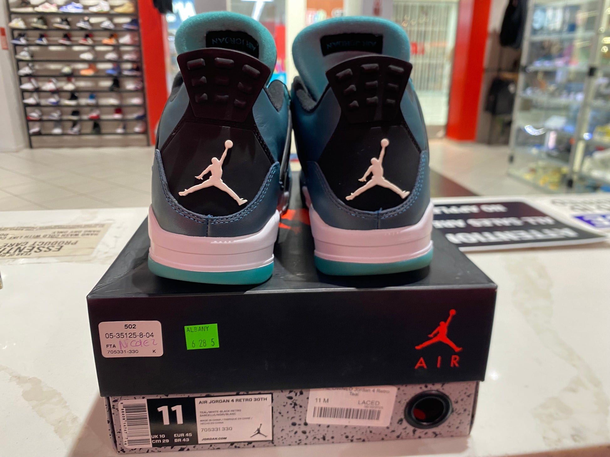 PRE OWNED Jordan 4 Retro Teal