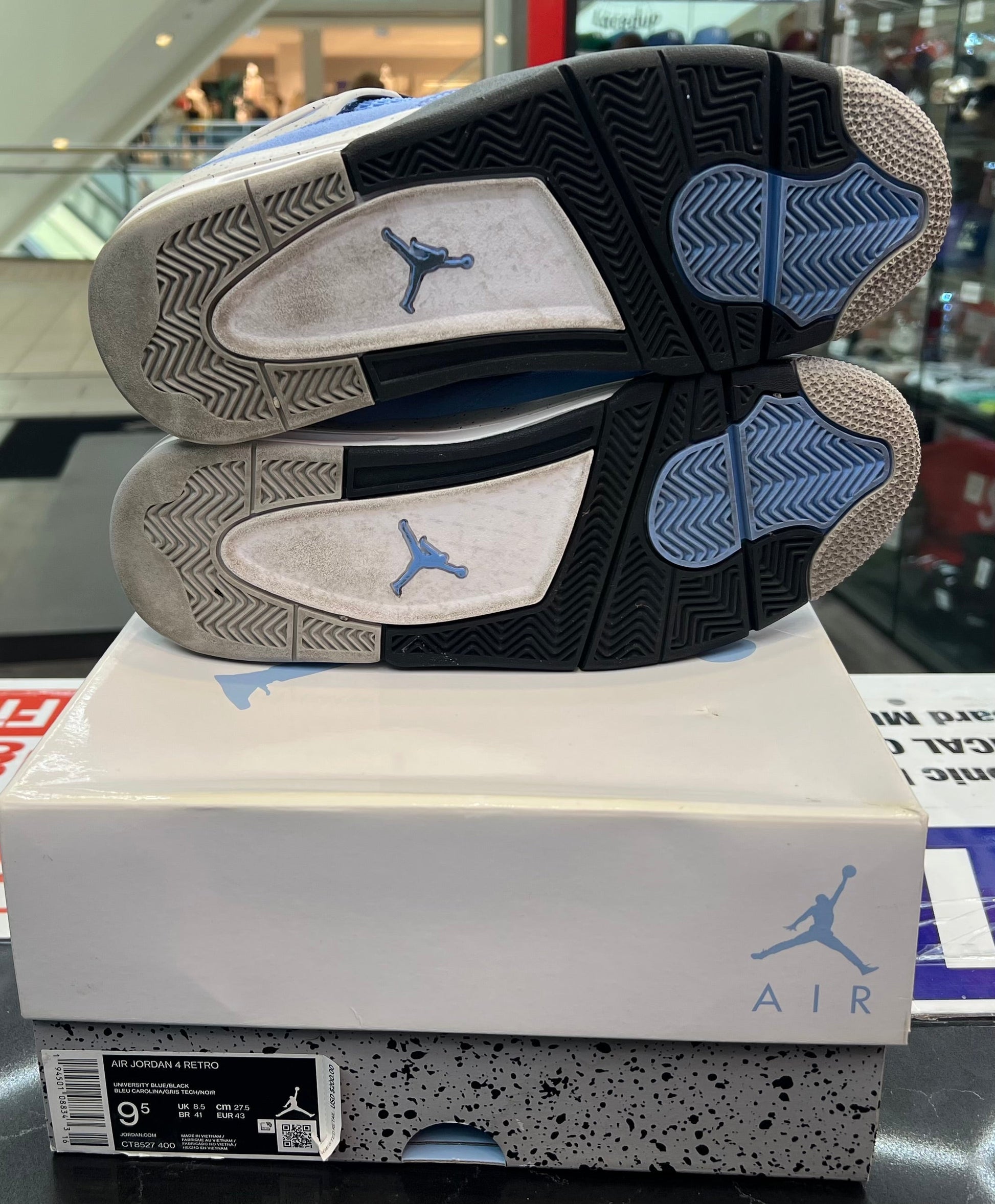 PRE OWNED Jordan 4 Retro University Blue