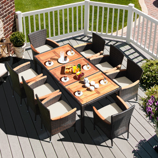 9 Pieces Rattan Dining Set with Acacia Wood Table and Stackable Cushioned Chairs
