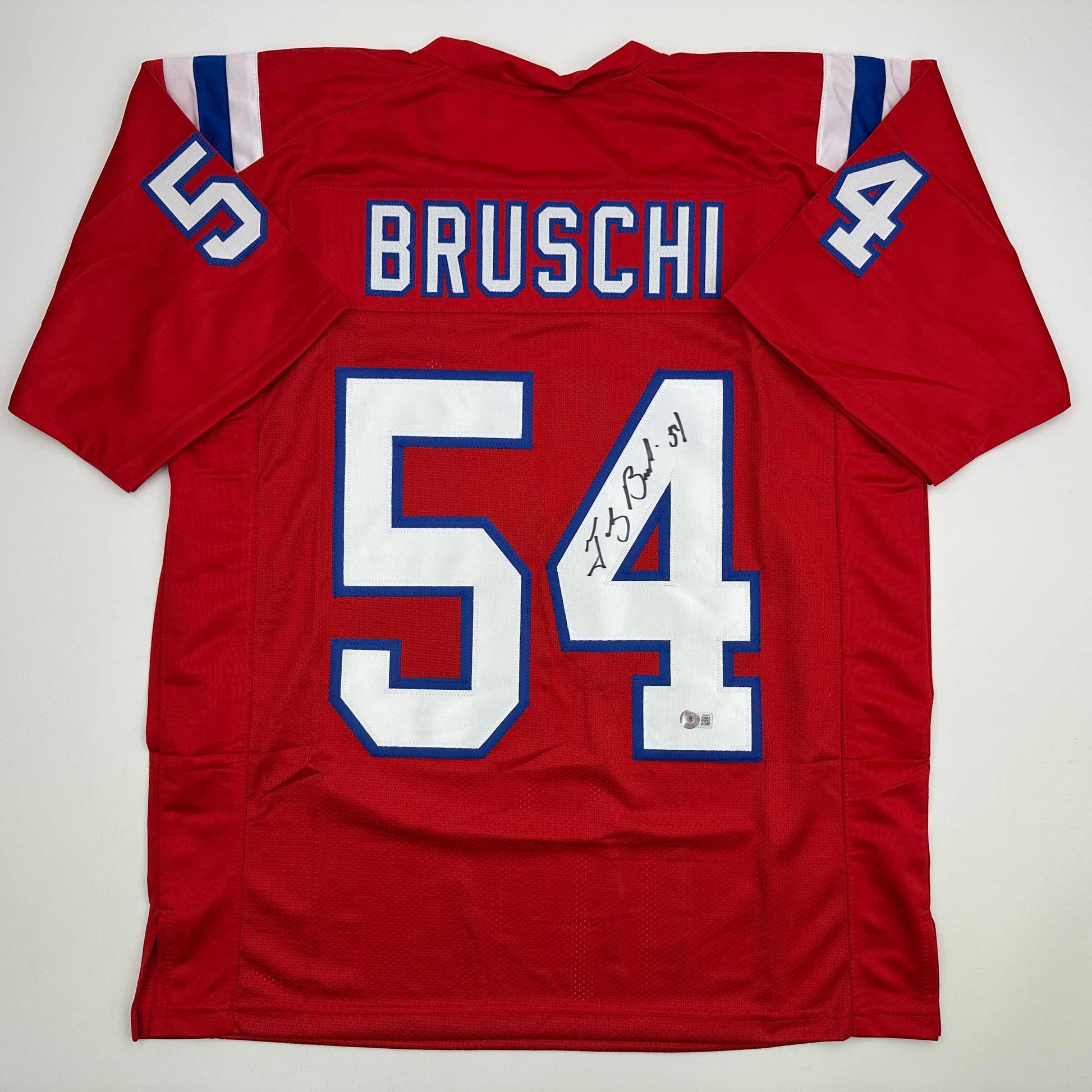 Autographed/Signed Tedy Bruschi New England Red Football Jersey Beckett BAS COA