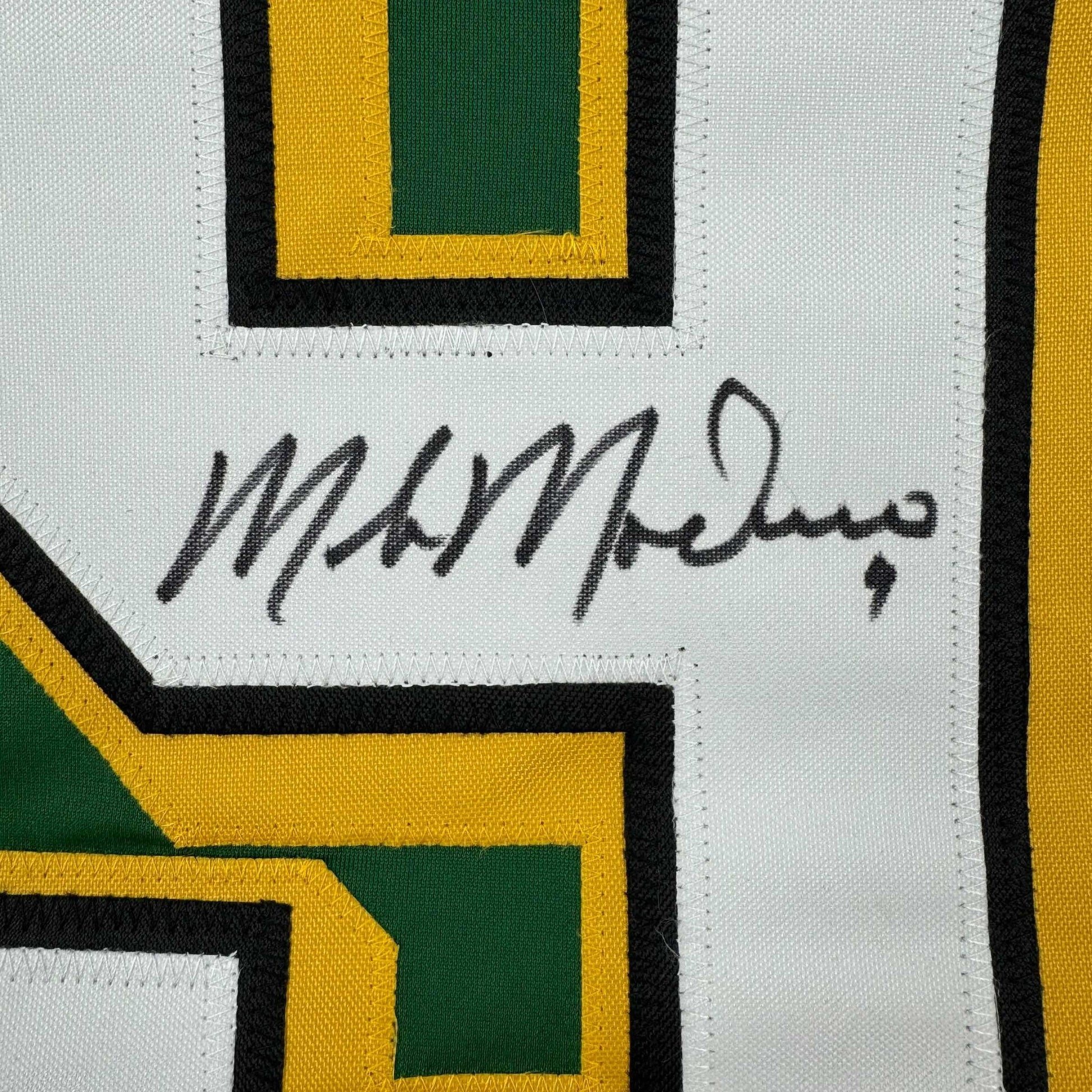 Autographed/Signed Mike Modano Minnesota Green Hockey Jersey Beckett BAS COA