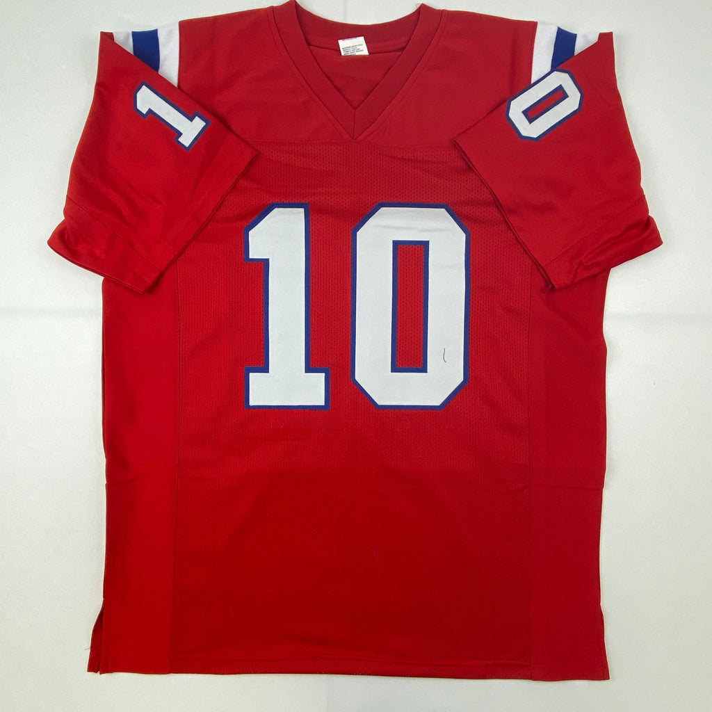 Autographed/Signed Mac Jones New England Red Football Jersey Beckett BAS COA