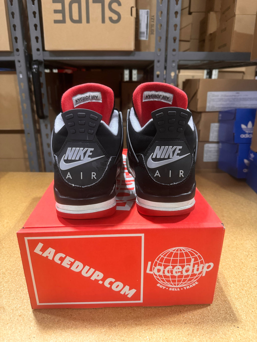 PRE OWNED Jordan 4 Retro Bred (2019)