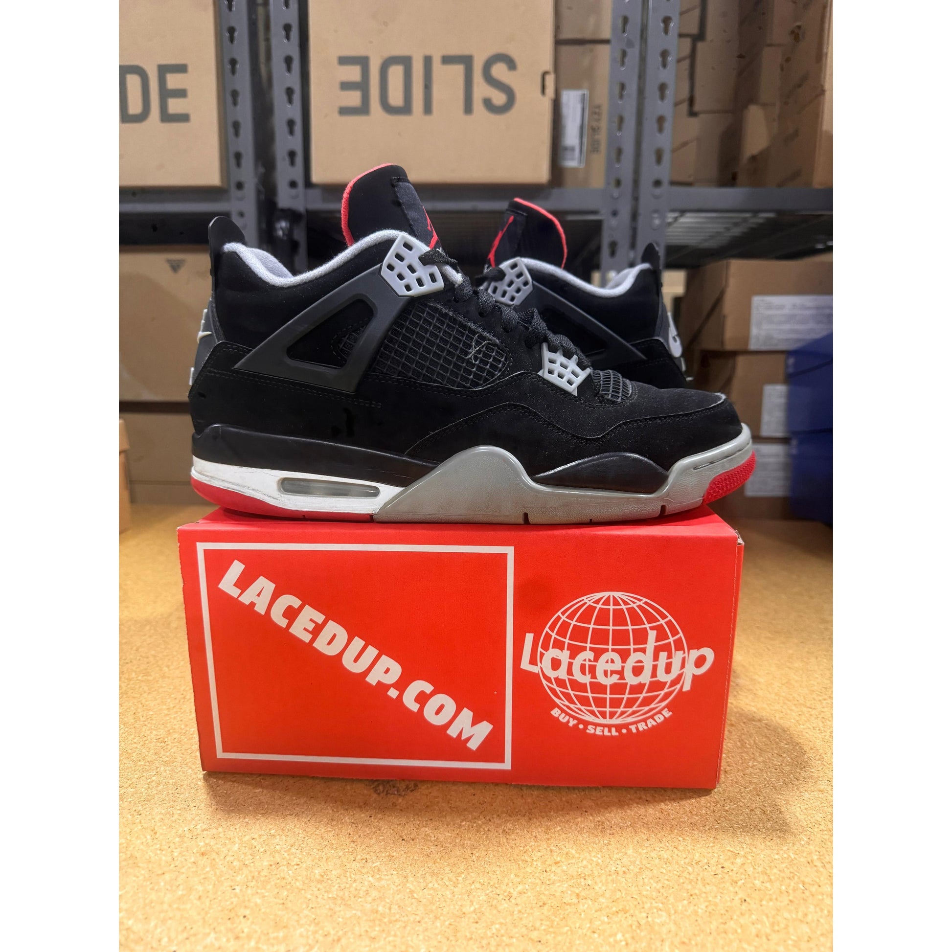 PRE OWNED Jordan 4 Retro Bred (2019)