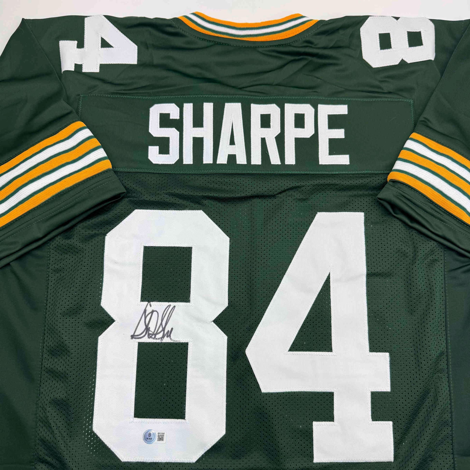 Autographed/Signed Sterling Sharpe Green Bay Green Football Jersey Beckett BAS COA